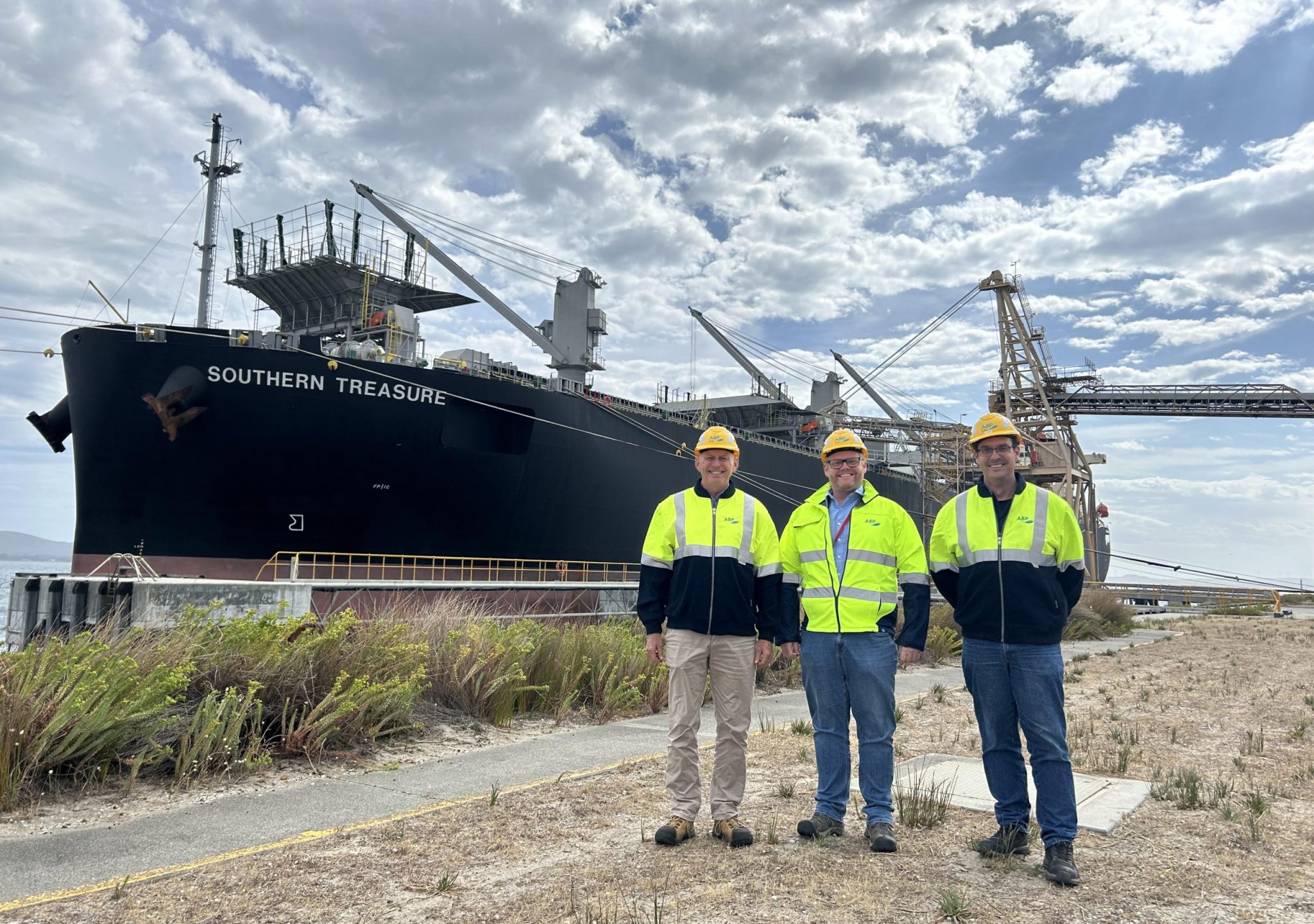 ABP staff celebrating the launch of the 300th woodchip vessel.  Pictured left to right: Carl Richardson, General Manager - Marketing; Darren Shelden, General Manager - Operations; Leon Allen, Port Manager - Albany Chip Terminal.